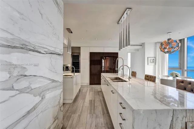 a bathroom with a sink double vanity and a shower