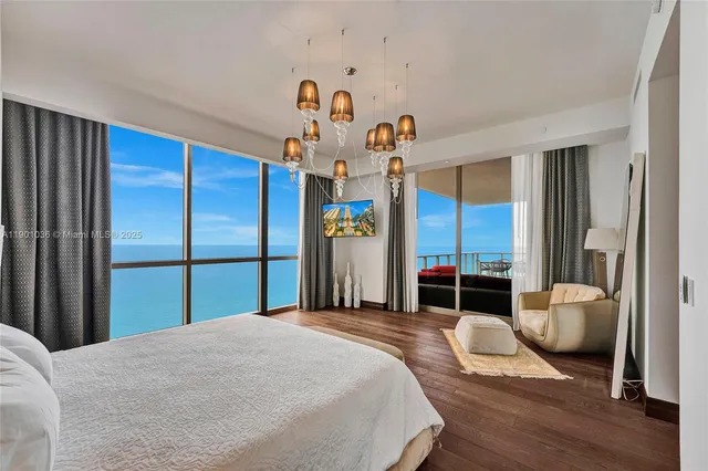 a bathroom with a granite countertop sink toilet mirror and shower