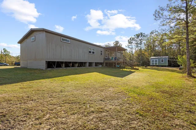 a view of a swimming pool with an outdoor space and seating area