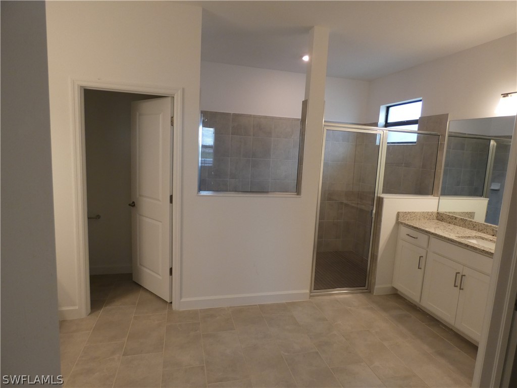 11379 Canopy Loop Fort Myers, FL 33913 - Photo 11 of 24 an empty room with mirror