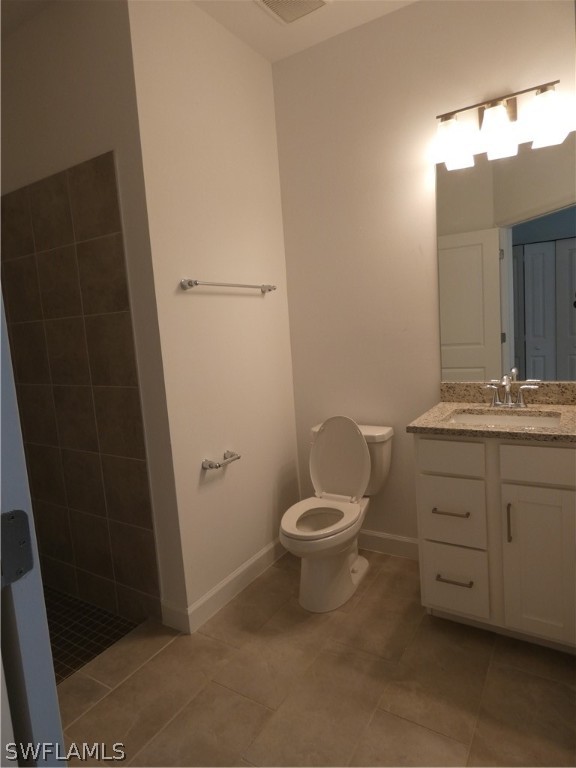 11379 Canopy Loop Fort Myers, FL 33913 - Photo 17 of 24 a bathroom with a toilet and a sink