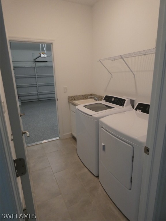 11379 Canopy Loop Fort Myers, FL 33913 - Photo 23 of 24 a utility room with dryer and washer