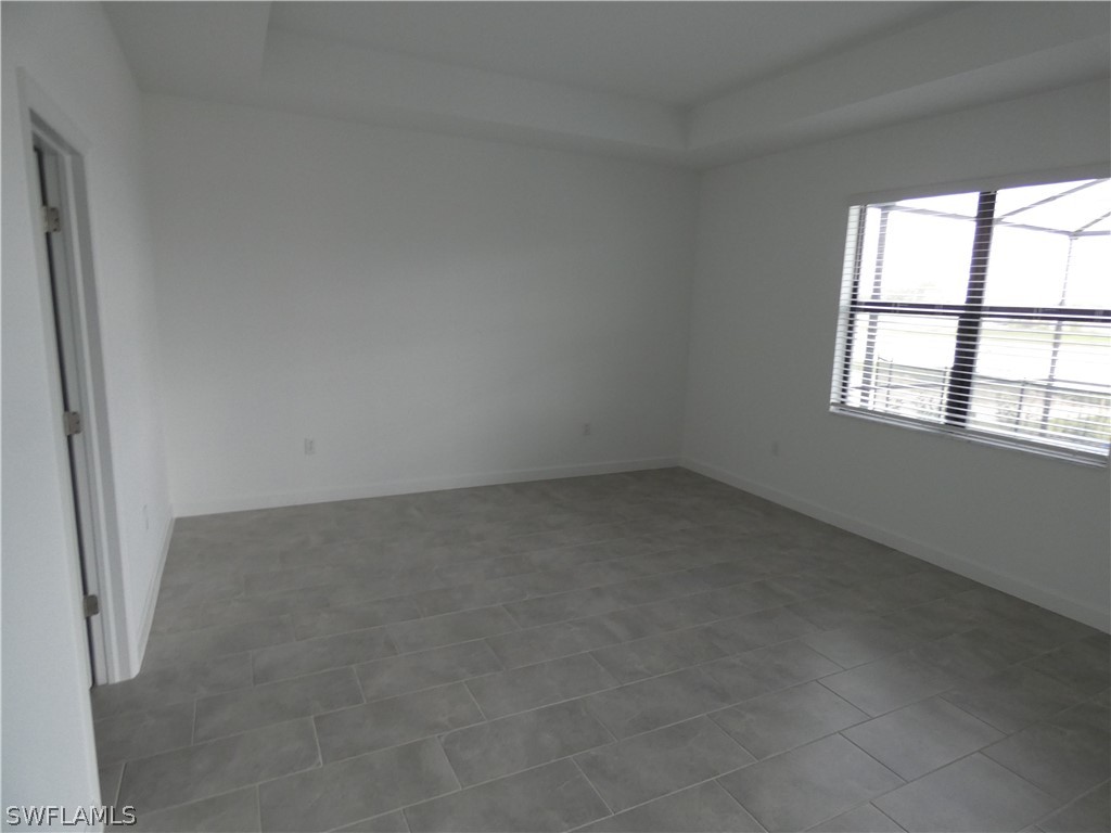 11379 Canopy Loop Fort Myers, FL 33913 - Photo 10 of 24 an empty room with a window