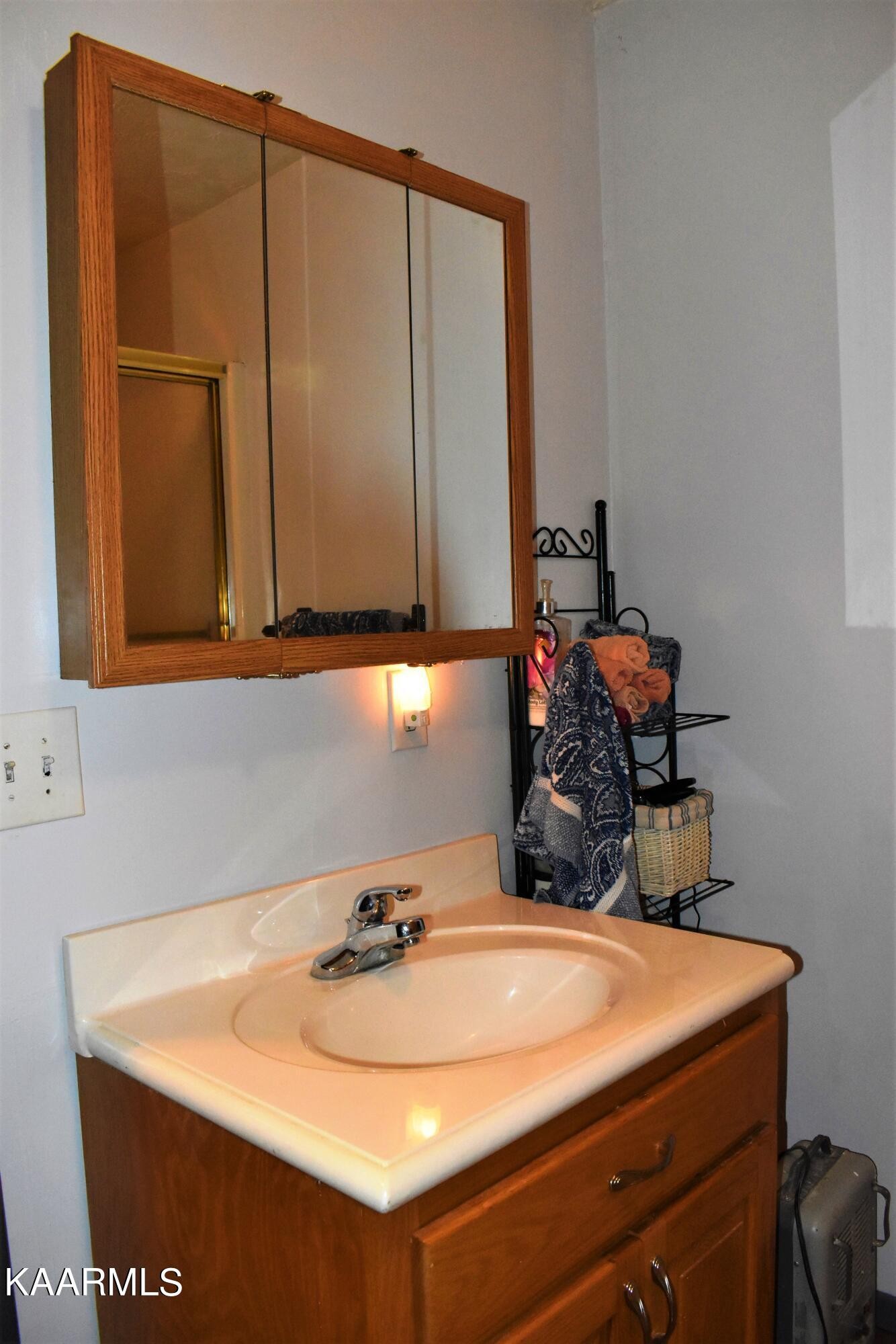 419 Stone Loop Crossville, TN 38571 - Photo 23 of 46 a bathroom with a sink and a mirror