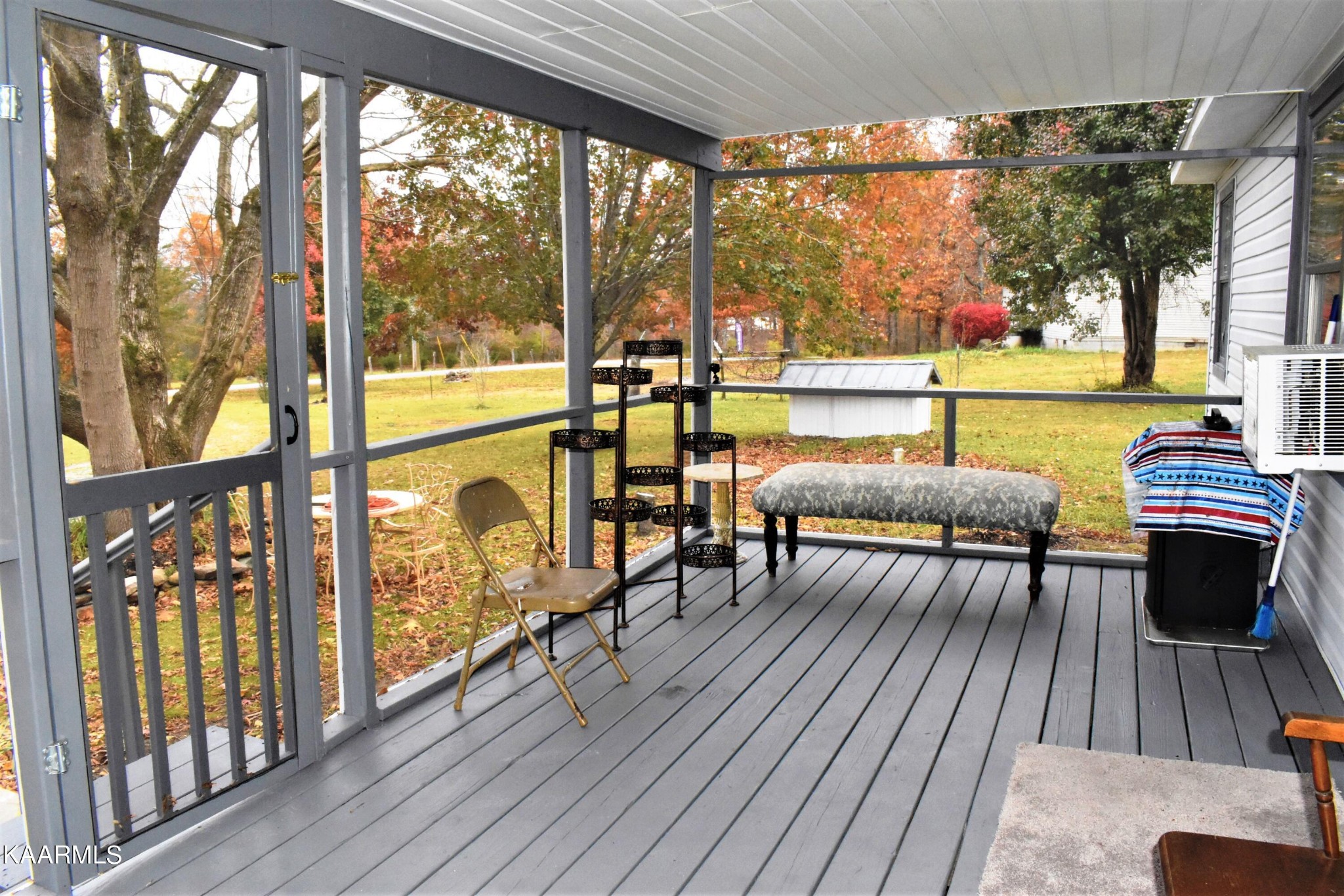 419 Stone Loop Crossville, TN 38571 - Photo 31 of 46 a view of a balcony with chairs and wooden floor