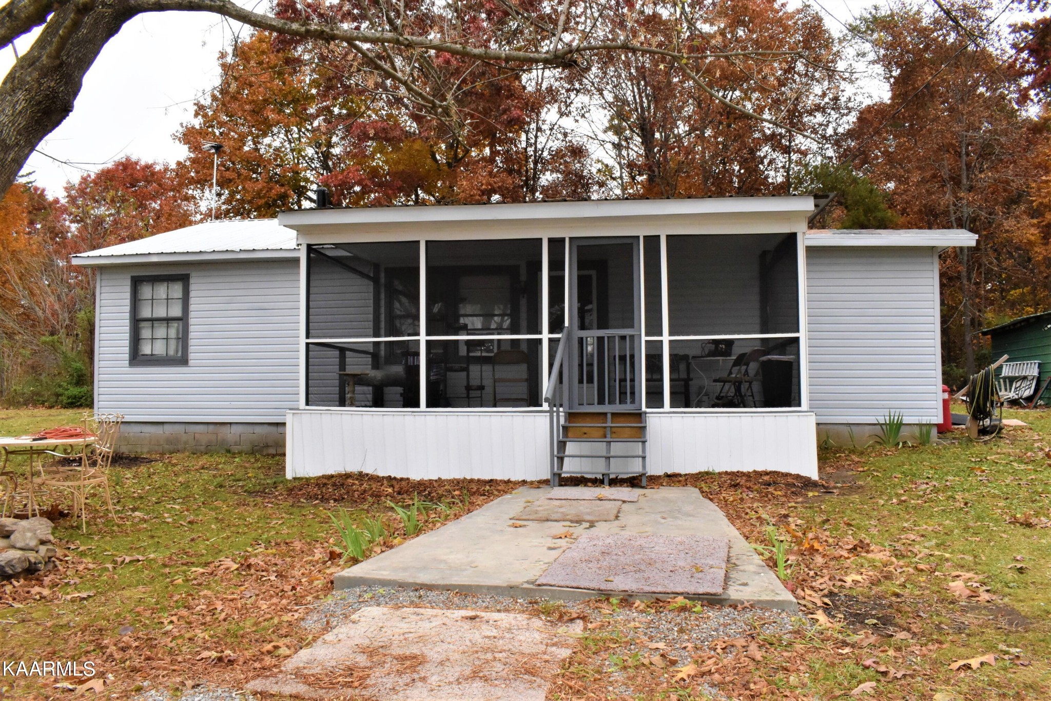 419 Stone Loop Crossville, TN 38571 - Photo 33 of 46 a view of a house with a yard and sitting area