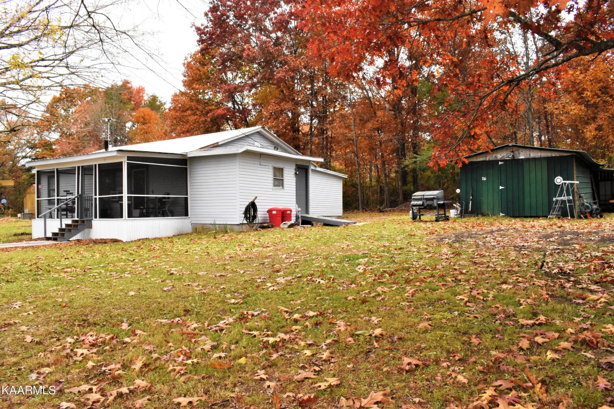 419 Stone Loop Crossville, TN 38571 - Photo 35 of 46 a view of a house with a backyard