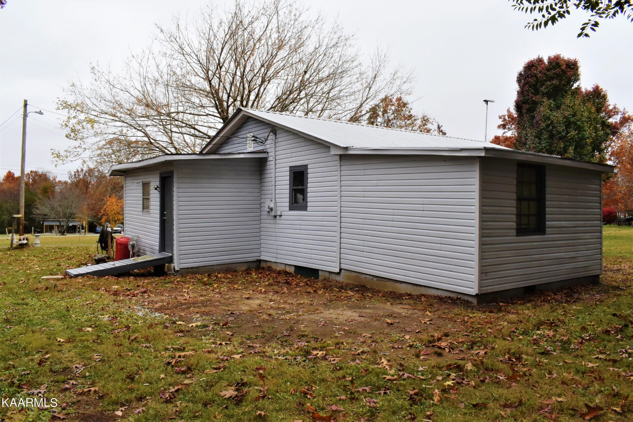 419 Stone Loop Crossville, TN 38571 - Photo 38 of 46 a view of a house with a yard