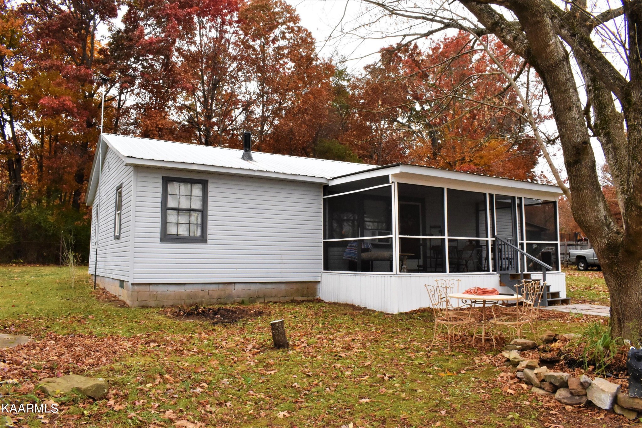 419 Stone Loop Crossville, TN 38571 - Photo 4 of 46 a house with trees in the background