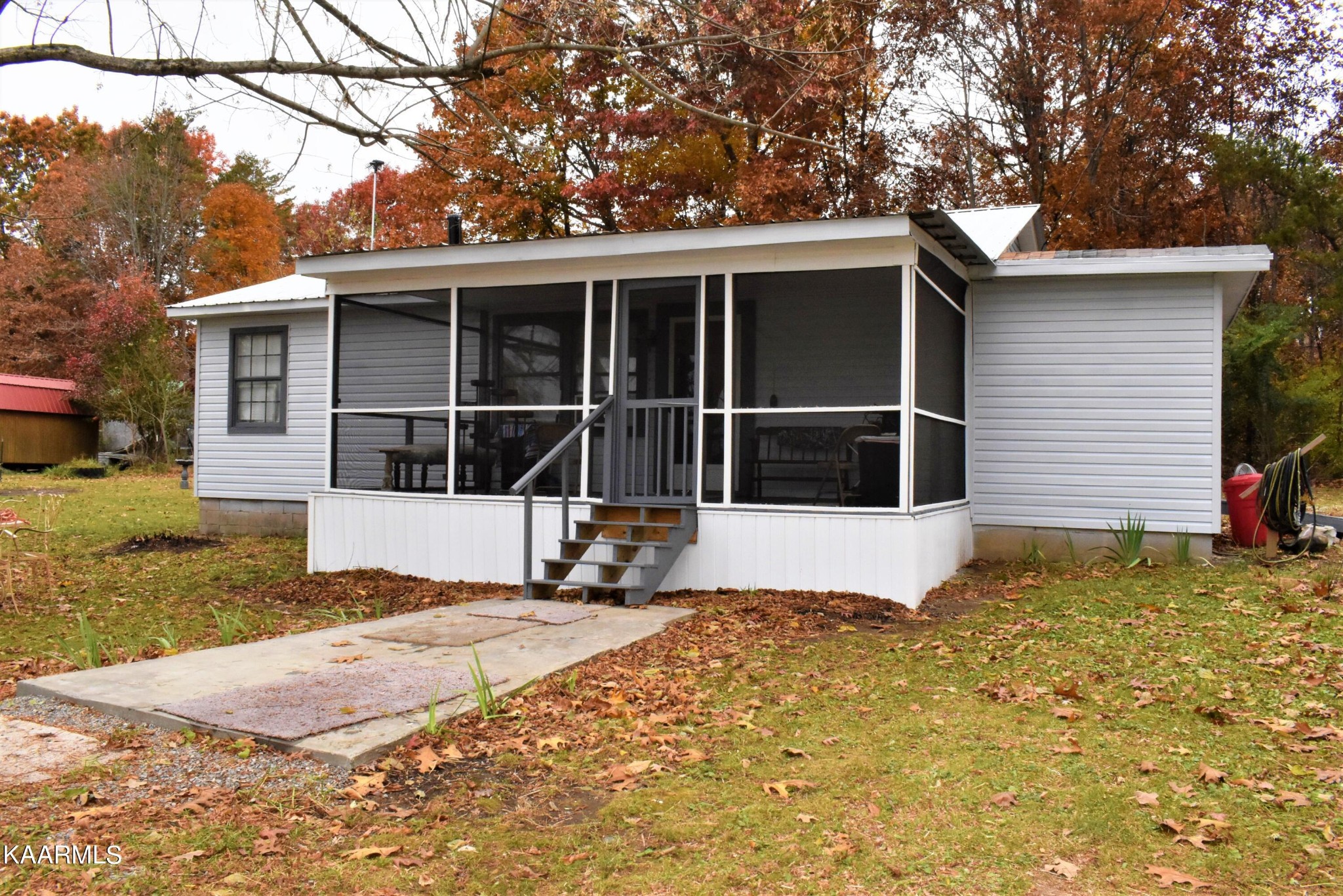 419 Stone Loop Crossville, TN 38571 - Photo 5 of 46 a view of a house with a yard in the background