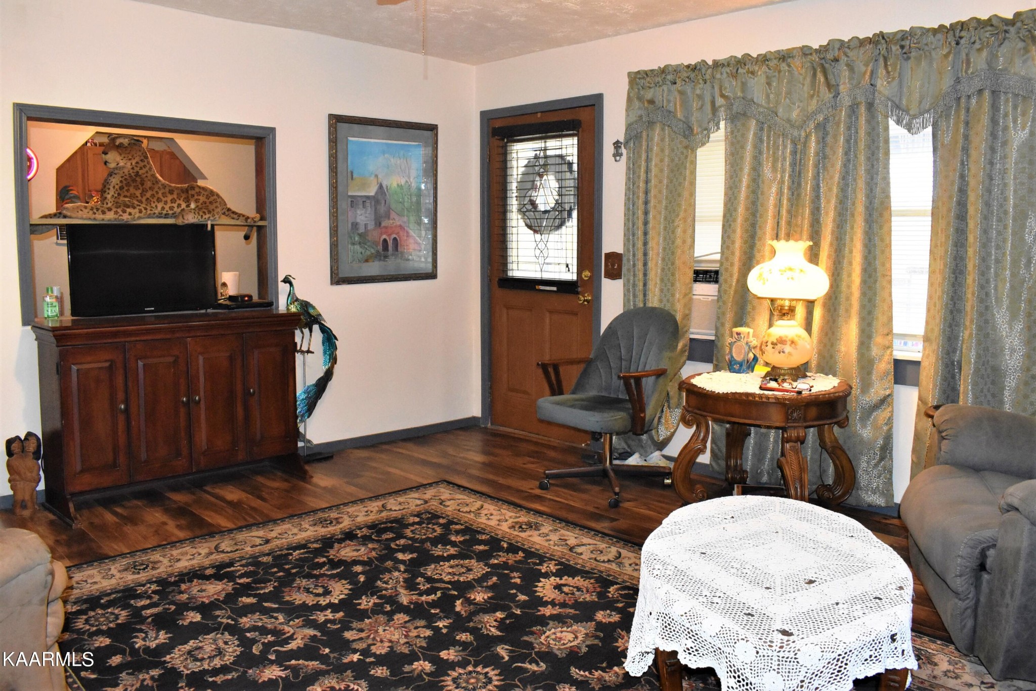 419 Stone Loop Crossville, TN 38571 - Photo 8 of 46 a living room with furniture and a flat screen tv