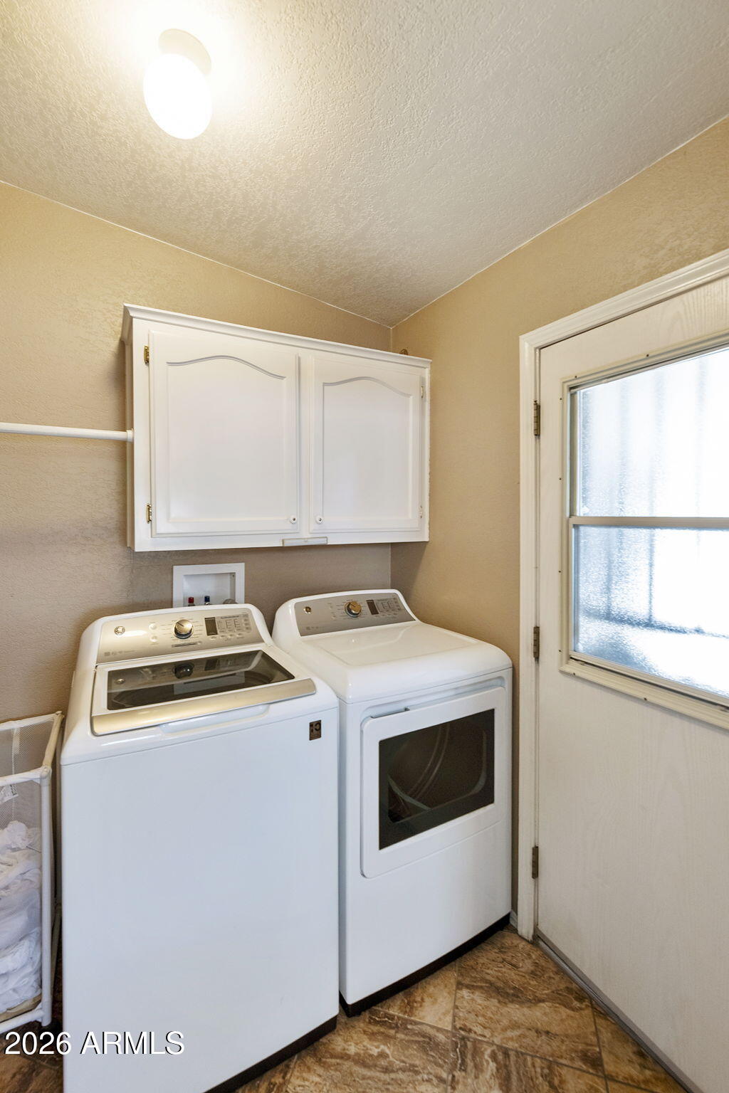 3700 South Tomahawk Road, Unit 23 Apache Junction, AZ 85119 - Photo 17 of 31 a utility room with dryer and washer