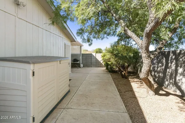 a view of a back yard of the house