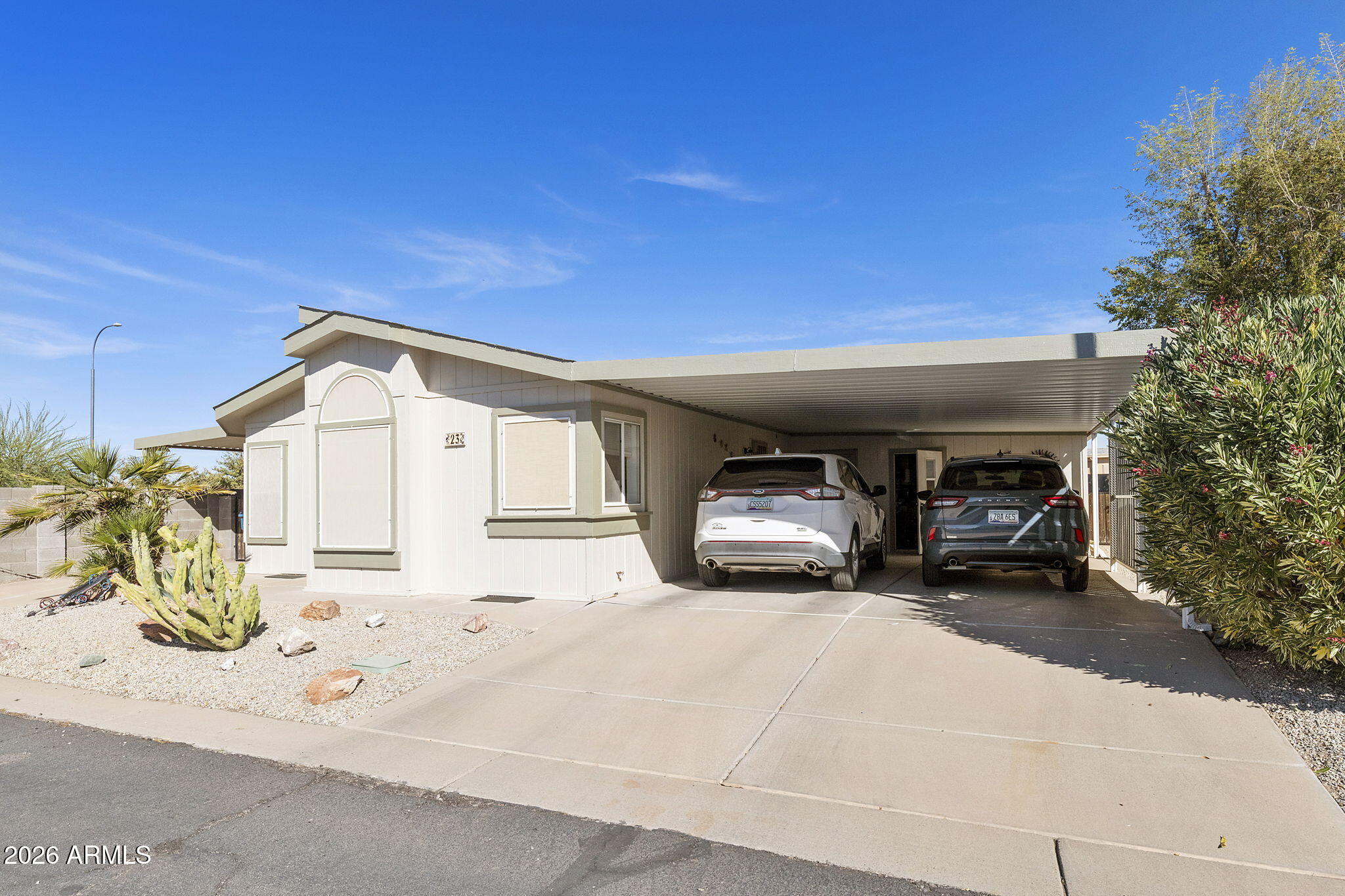 3700 South Tomahawk Road, Unit 23 Apache Junction, AZ 85119 - Photo 30 of 31 a view of a car garage