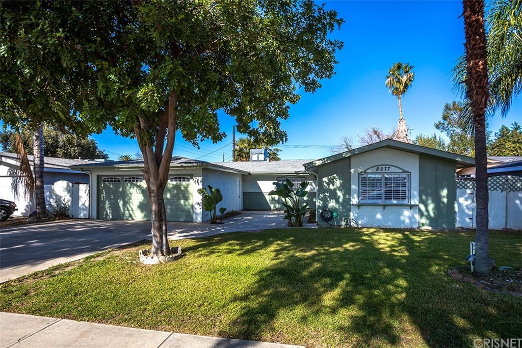 8277 Acapulco Place Riverside, CA 92504 - Photo 1 of 1 a front view of a house with a yard