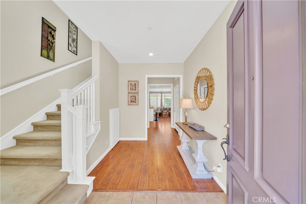 75 Gardenstone Path Irvine, CA 92620 - Photo 61 of 65 a view of a hallway with wooden floor and entryway