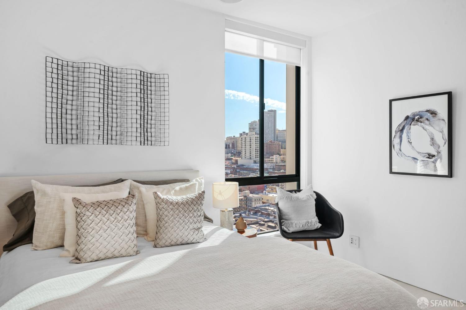 455 Vallejo Street, Unit PH6 San Francisco, CA 94133 - Photo 14 of 45 a bedroom with furniture and a large window