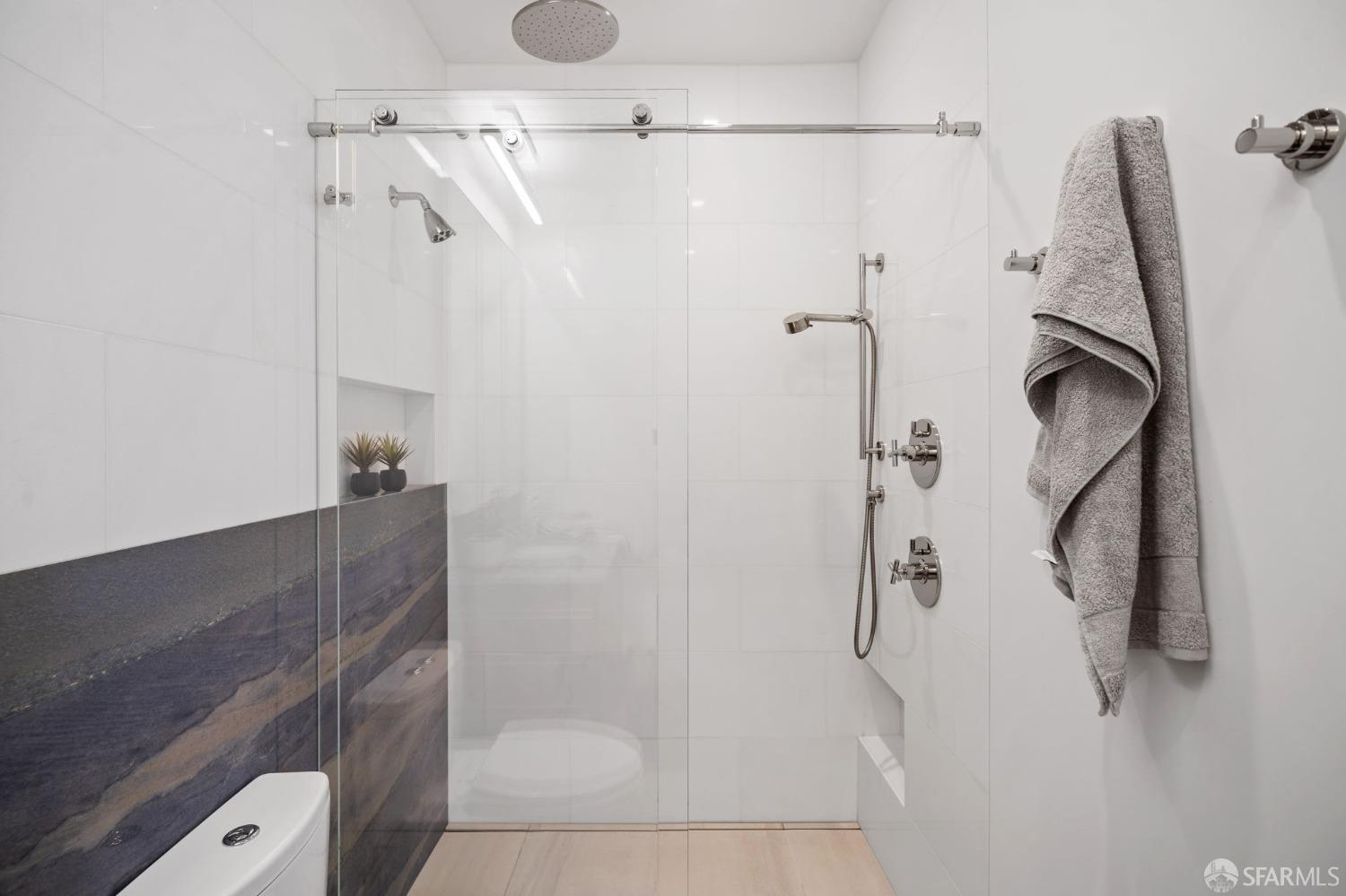 455 Vallejo Street, Unit PH6 San Francisco, CA 94133 - Photo 18 of 45 a bathroom with a shower and a shower