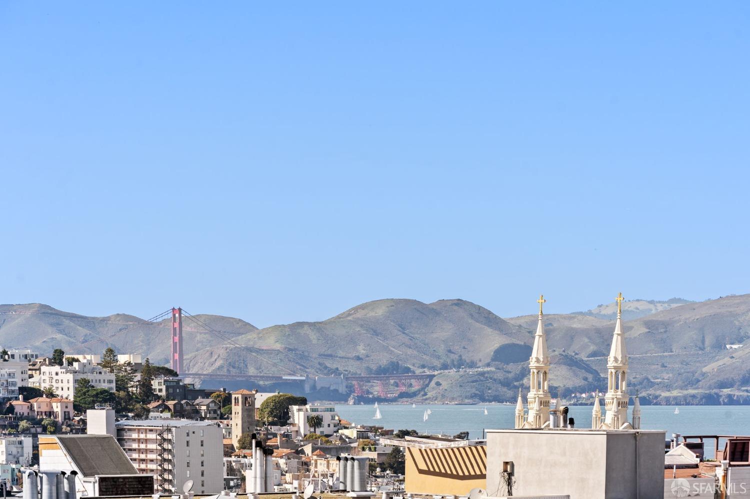 455 Vallejo Street, Unit PH6 San Francisco, CA 94133 - Photo 2 of 45 a view of a city with a building in the background