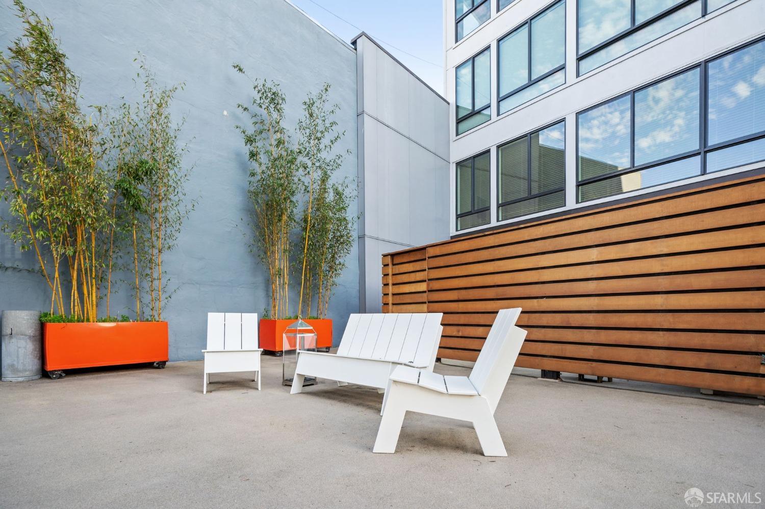 455 Vallejo Street, Unit PH6 San Francisco, CA 94133 - Photo 24 of 45 a view of patio with a table and chairs