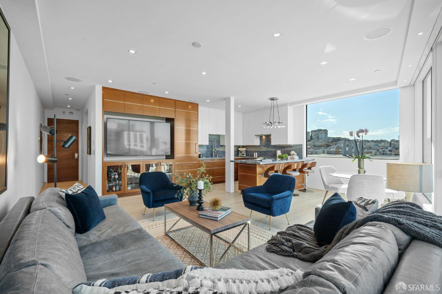 455 Vallejo Street, Unit PH6 San Francisco, CA 94133 - Photo 4 of 45 a living room with furniture and a large window