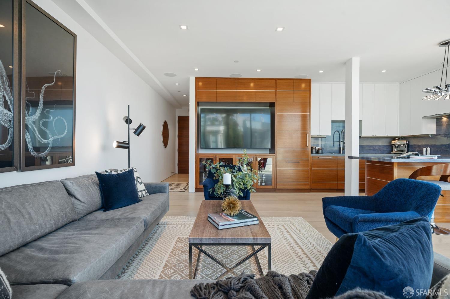455 Vallejo Street, Unit PH6 San Francisco, CA 94133 - Photo 5 of 45 a living room with furniture and a large window