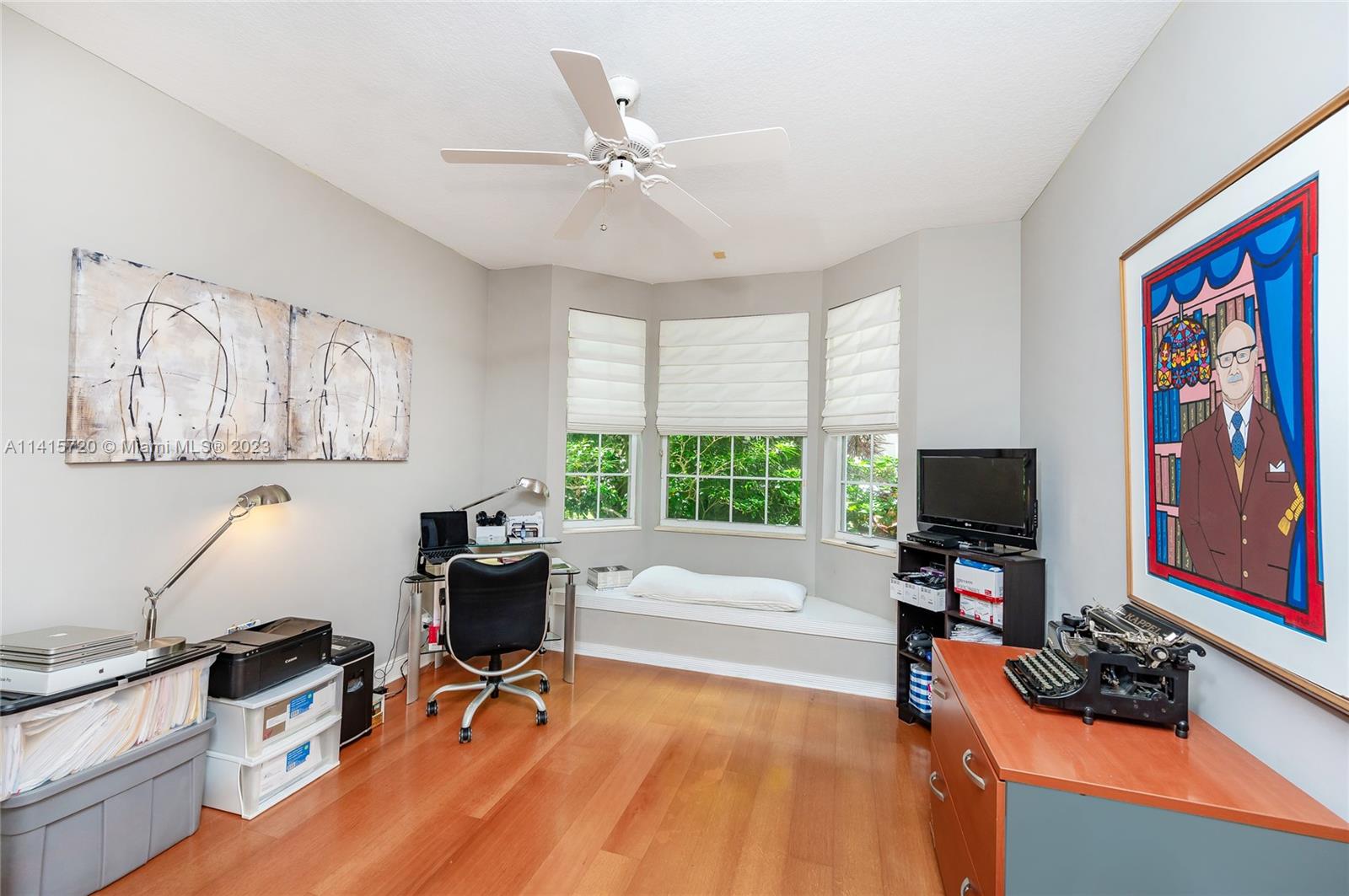 4167 Briarcliff Circle Boca Raton, FL 33496 - Photo 26 of 56 a view of a workspace with furniture and a window