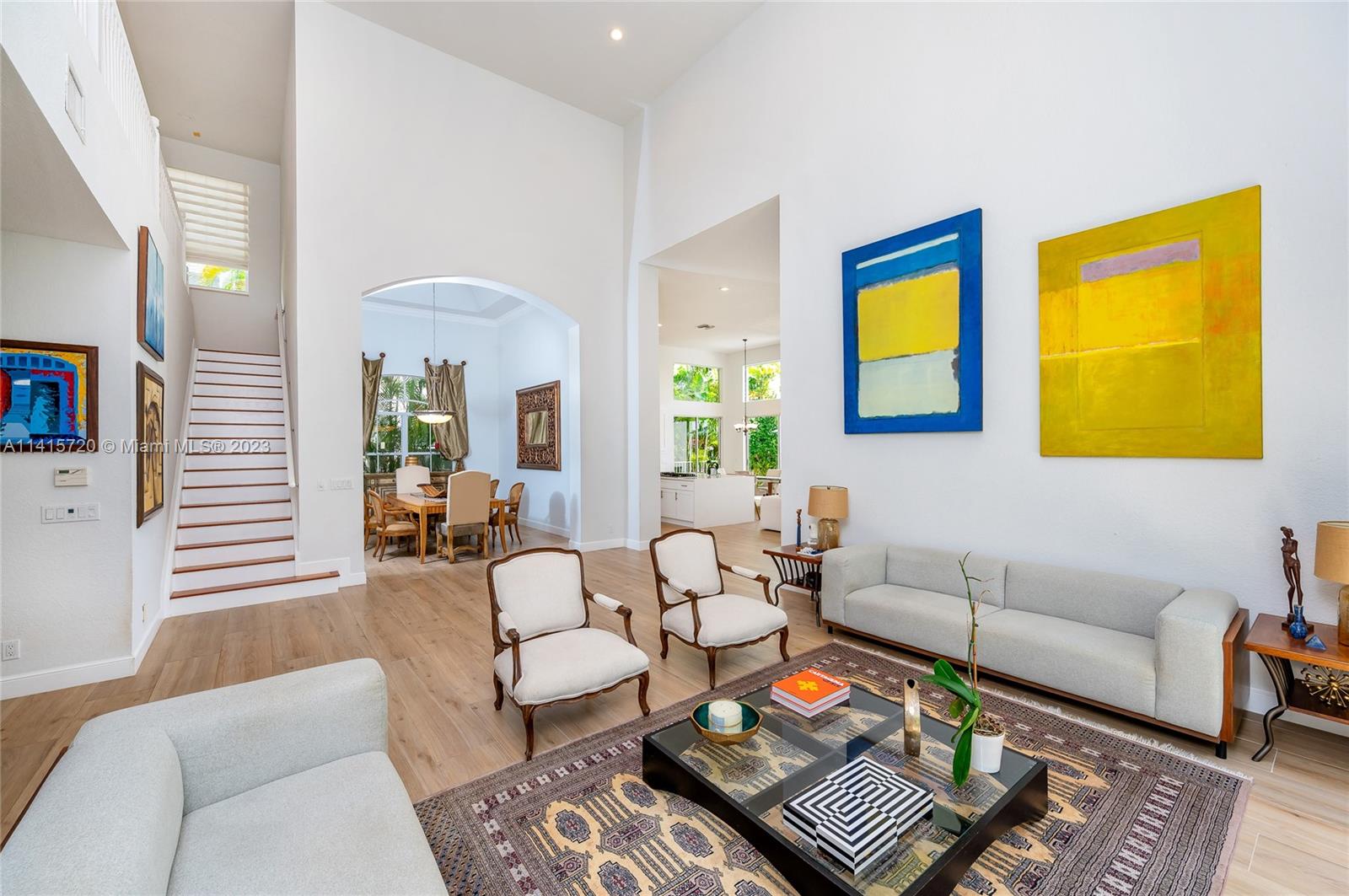 4167 Briarcliff Circle Boca Raton, FL 33496 - Photo 8 of 56 a living room with furniture and a rug