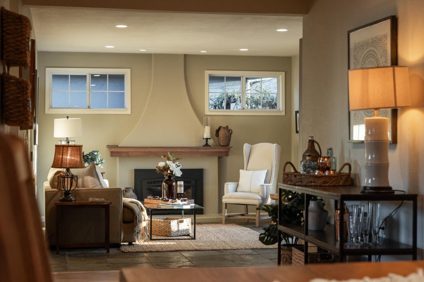 105 Wesley Street Capitola, CA 95010 - Photo 22 of 55 a living room with furniture and a fireplace