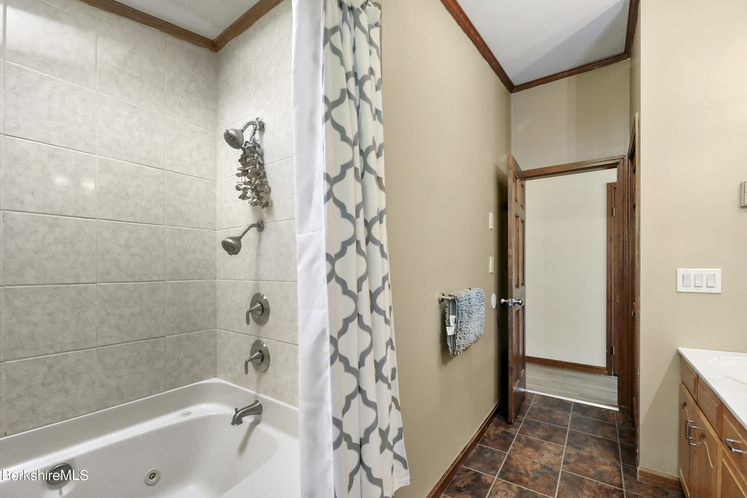 77 Shawnee Shore Road Becket, MA 01223 - Photo 16 of 28 a bathroom with a bathtub and shower