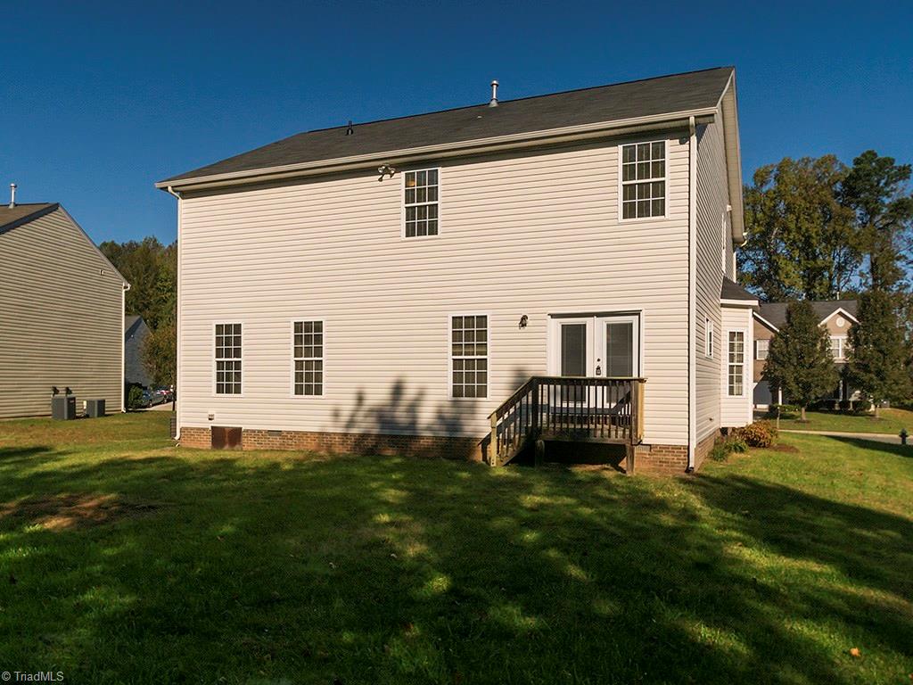 1309 Sharp Ridge Road Greensboro, NC 27406 - Photo 2 of 30 Flat Back Yard with Lg Storage builing