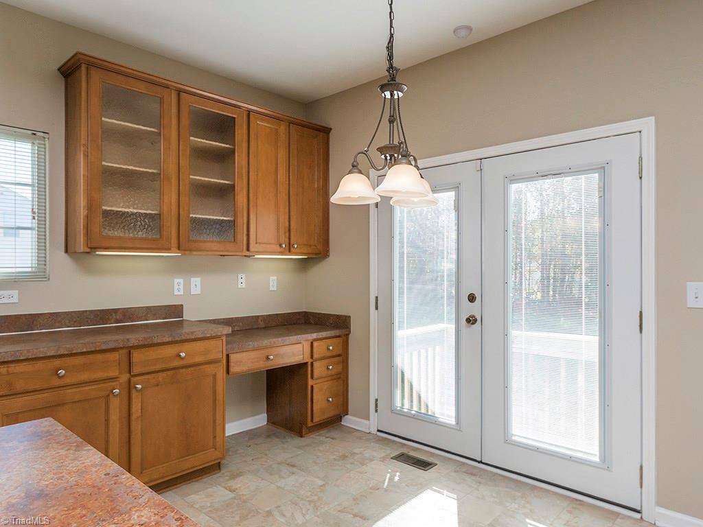 1309 Sharp Ridge Road Greensboro, NC 27406 - Photo 13 of 30 Kitchen Desk area, Door leads to the backyard