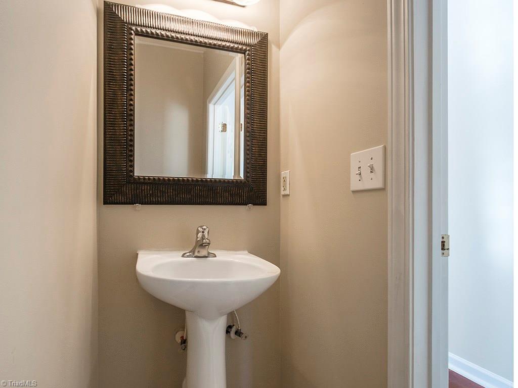 1309 Sharp Ridge Road Greensboro, NC 27406 - Photo 21 of 30 1/2 Bath on Main with Pedestal Sink