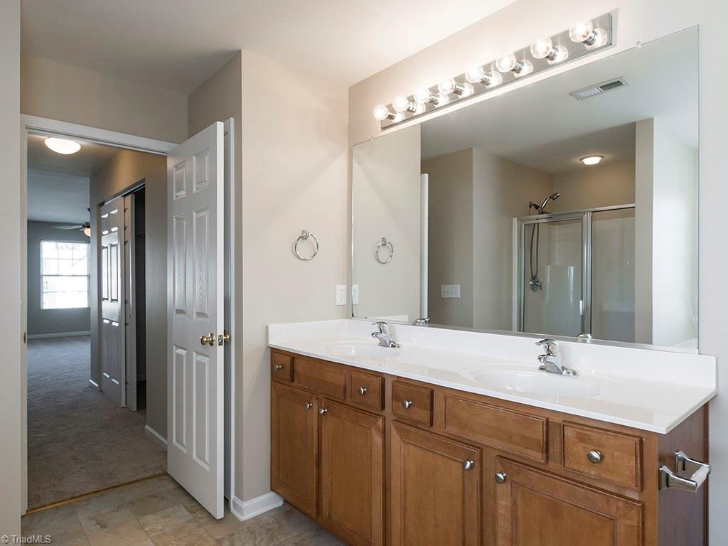 1309 Sharp Ridge Road Greensboro, NC 27406 - Photo 23 of 30 Master Bath showing double vanities