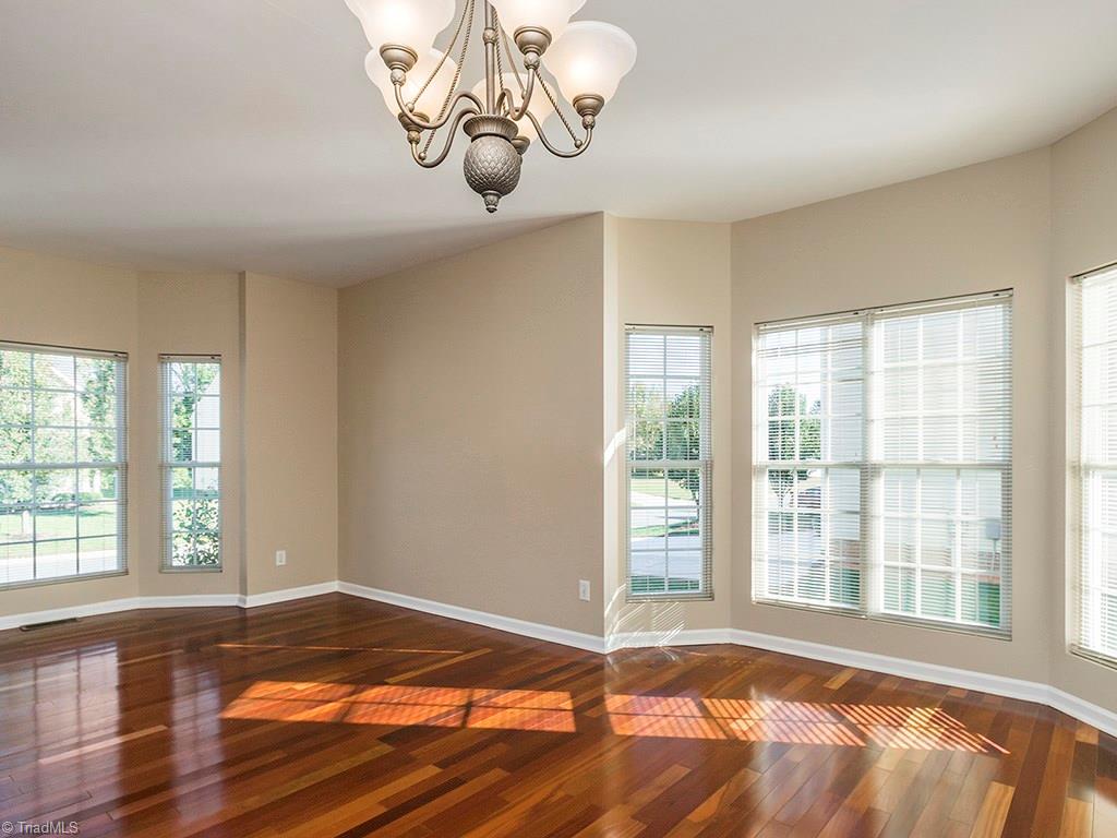 1309 Sharp Ridge Road Greensboro, NC 27406 - Photo 4 of 30 Dining room showing both bay windows, Could be separated into a Dining room and formal living room