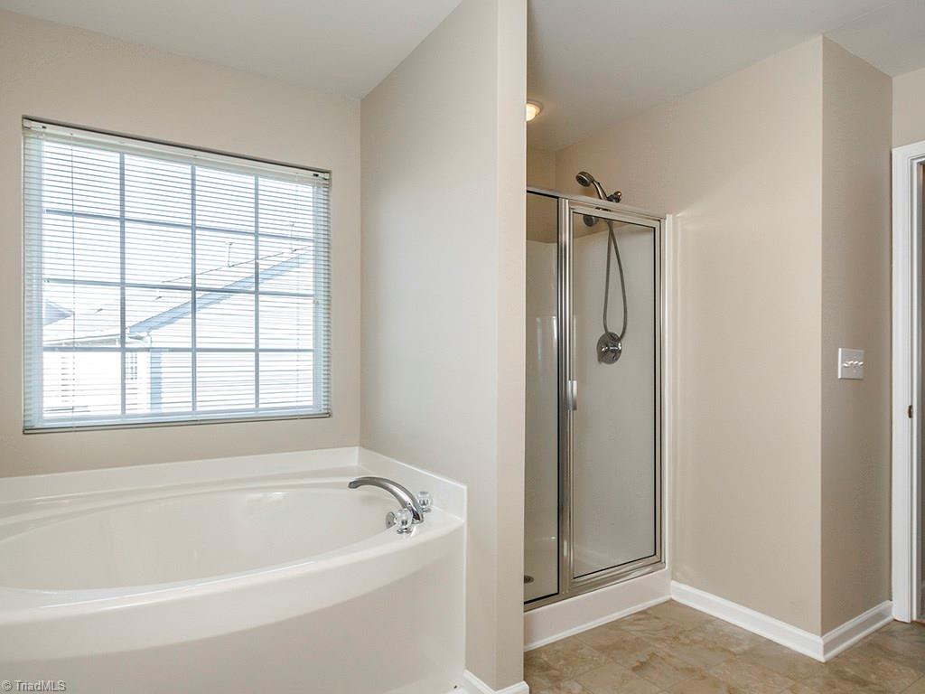 1309 Sharp Ridge Road Greensboro, NC 27406 - Photo 6 of 30 Master bath with Garden Tub and Separate shower. Also offers Double Vanitys