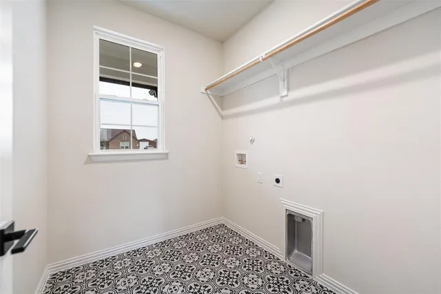 a view of a hallway with wooden floor windows and a living room