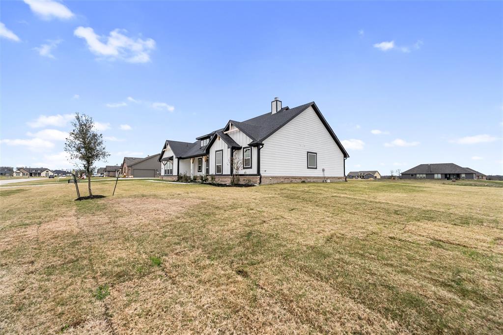 3107 White Oak Road Terrell, TX 75161 - Photo 5 of 40 a view of a house with a yard