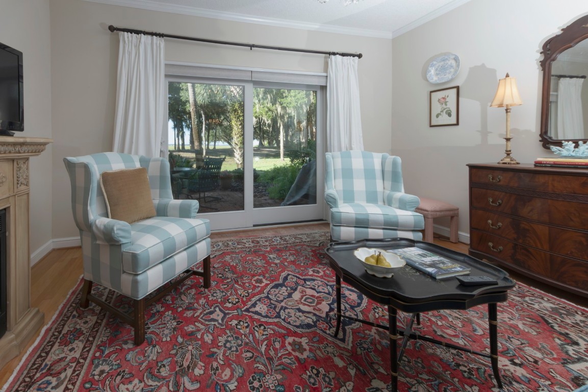 3052 Sea Marsh Road Fernandina Beach, FL 32034 - Photo 19 of 41 a living room with furniture and a window