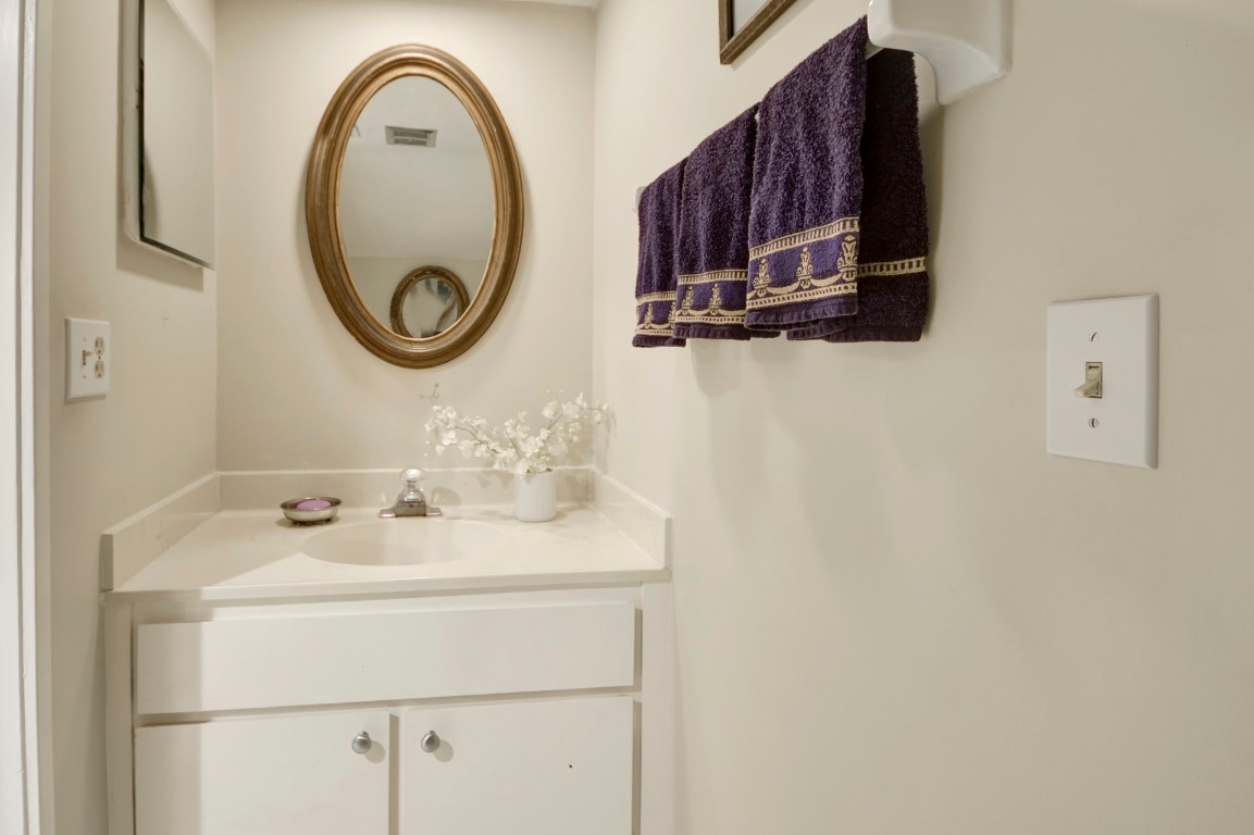 3052 Sea Marsh Road Fernandina Beach, FL 32034 - Photo 20 of 41 a bathroom with a sink and a mirror