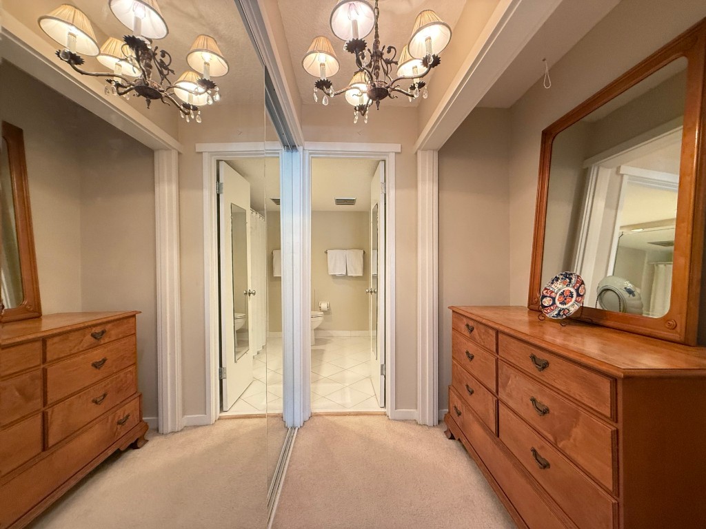 3052 Sea Marsh Road Fernandina Beach, FL 32034 - Photo 24 of 41 a spacious bathroom with a double vanity sink and a mirror