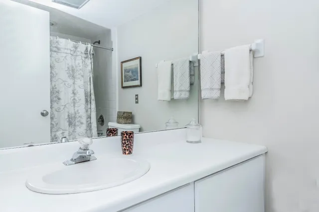 a view of a swimming pool with an outdoor space and seating area