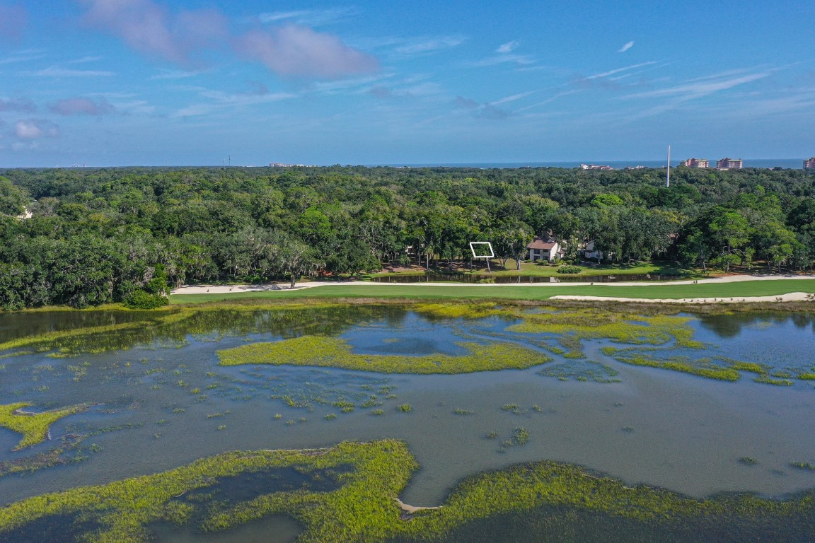 3052 Sea Marsh Road Fernandina Beach, FL 32034 - Photo 32 of 41 a view of a swimming pool with an outdoor space and seating area