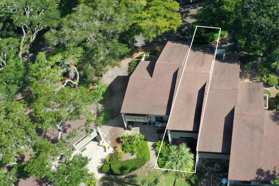 3052 Sea Marsh Road Fernandina Beach, FL 32034 - Photo 34 of 41 an aerial view of house with yard and mountain view in back
