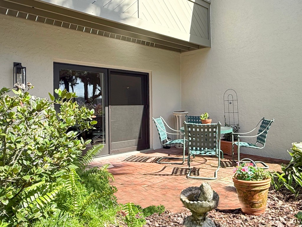 3052 Sea Marsh Road Fernandina Beach, FL 32034 - Photo 39 of 41 a outdoor space with a table and chairs