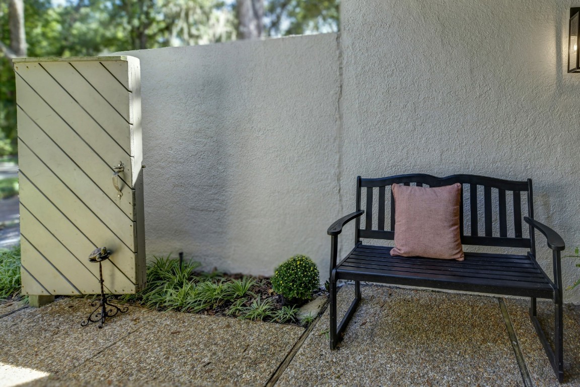 3052 Sea Marsh Road Fernandina Beach, FL 32034 - Photo 4 of 41 a view of a bench in back yard