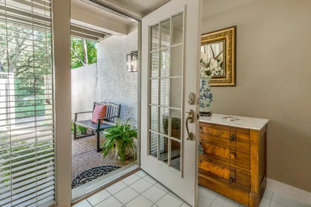 a bathroom with a sink a mirror and a shower