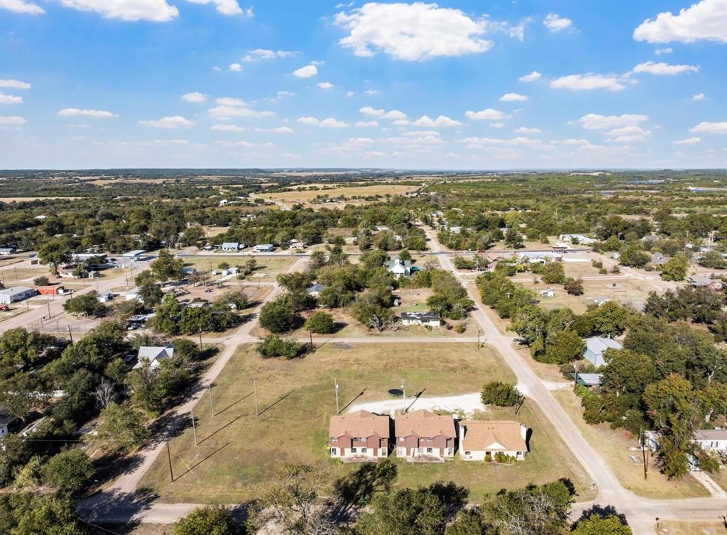 905 Shepherd Street Morgan, TX 76671 - Photo 4 of 5 an aerial view of residential houses with outdoor space