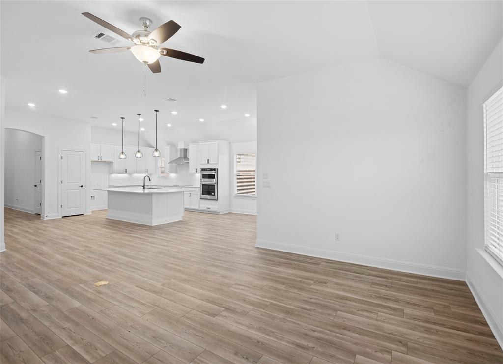 181 Slenderleaf Drive Marble Falls, TX 78654 - Photo 29 of 29 a view of kitchen with wooden floor and window