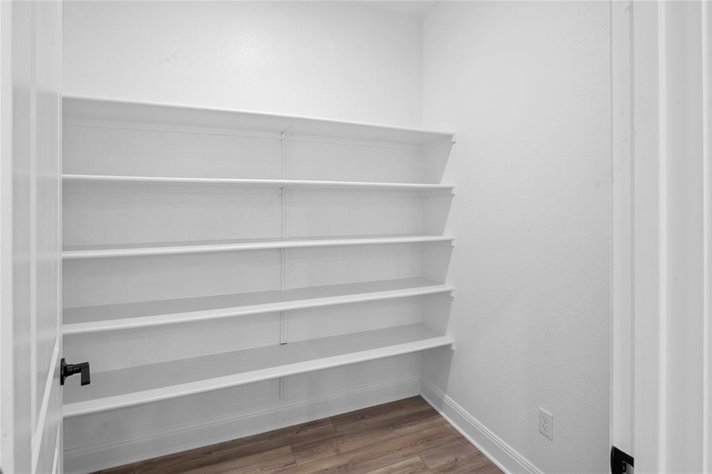 181 Slenderleaf Drive Marble Falls, TX 78654 - Photo 17 of 29 a view of walk in closet with empty racks